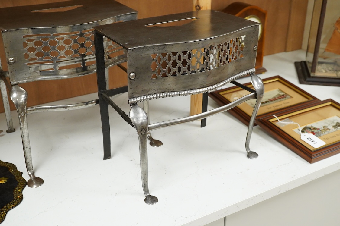 Two late Georgian pierced steel footman, 29cm high